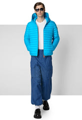 Man wearing bright blue recycled polyester jacket with blue cargo pants and sunglasses | Save The Duck