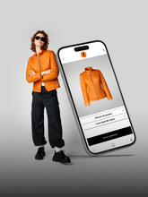 Fashionable customer in sunglasses posing next to a large smartphone displaying SaveTheDuck's orange jacket." | Save The Duck