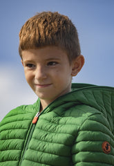 Young boy wearing a green jacket | Save The Duck